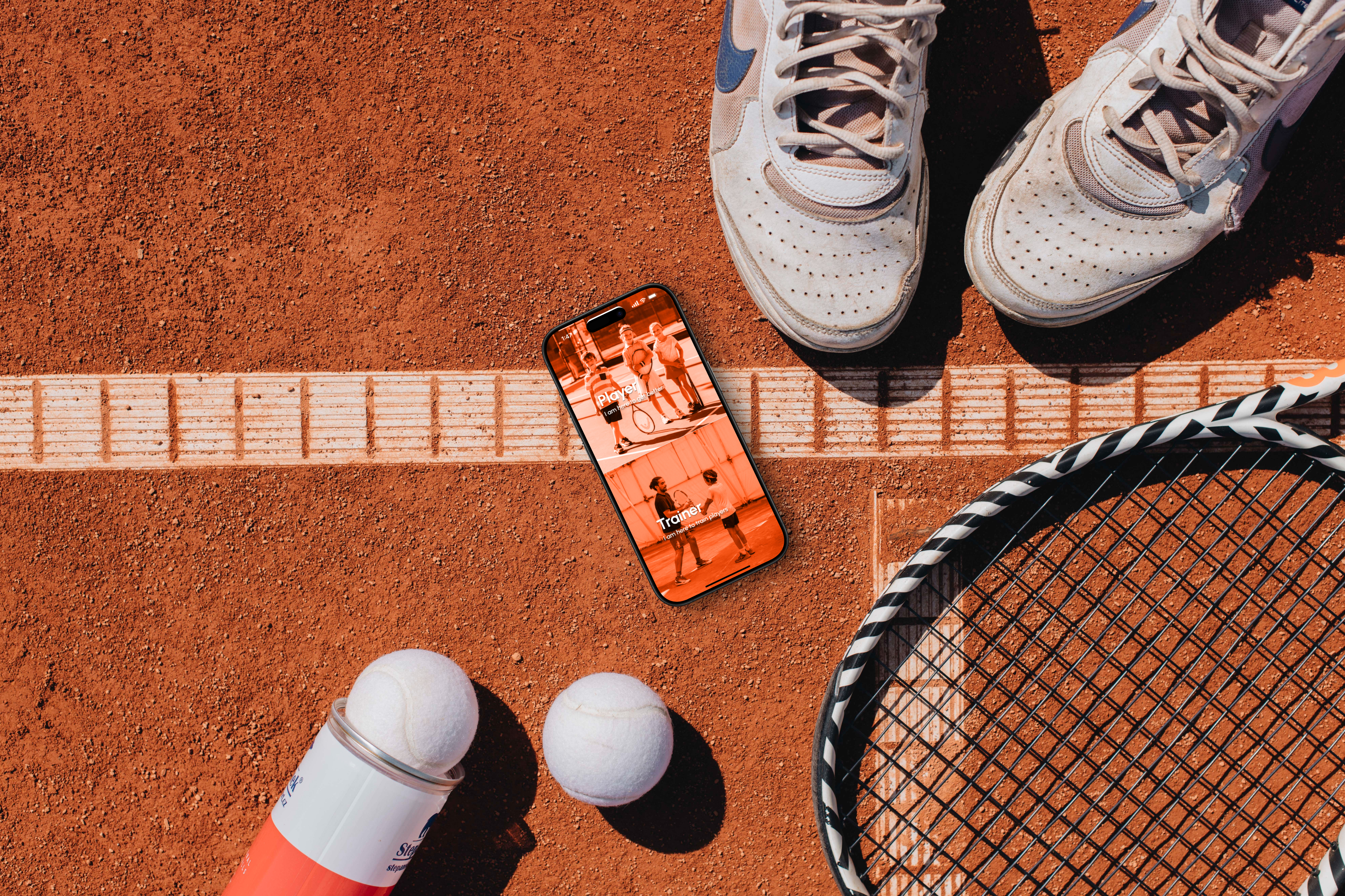 Tennis court, shoes, phone, and card
